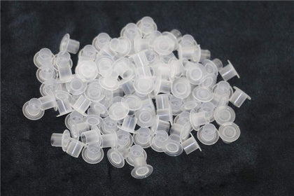 Needlehouse front packaging showing 1000 clear ink caps and bulk value