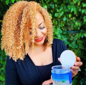 Nefertiti's Secrets styled curls in sunlight demonstrating frizz control