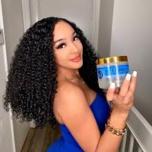 Nefertiti's Secrets jar held in hand showing true 16 oz scale