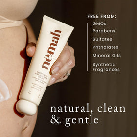 Nemah applied on pregnant belly demonstrating gentle massage and hydrated skin