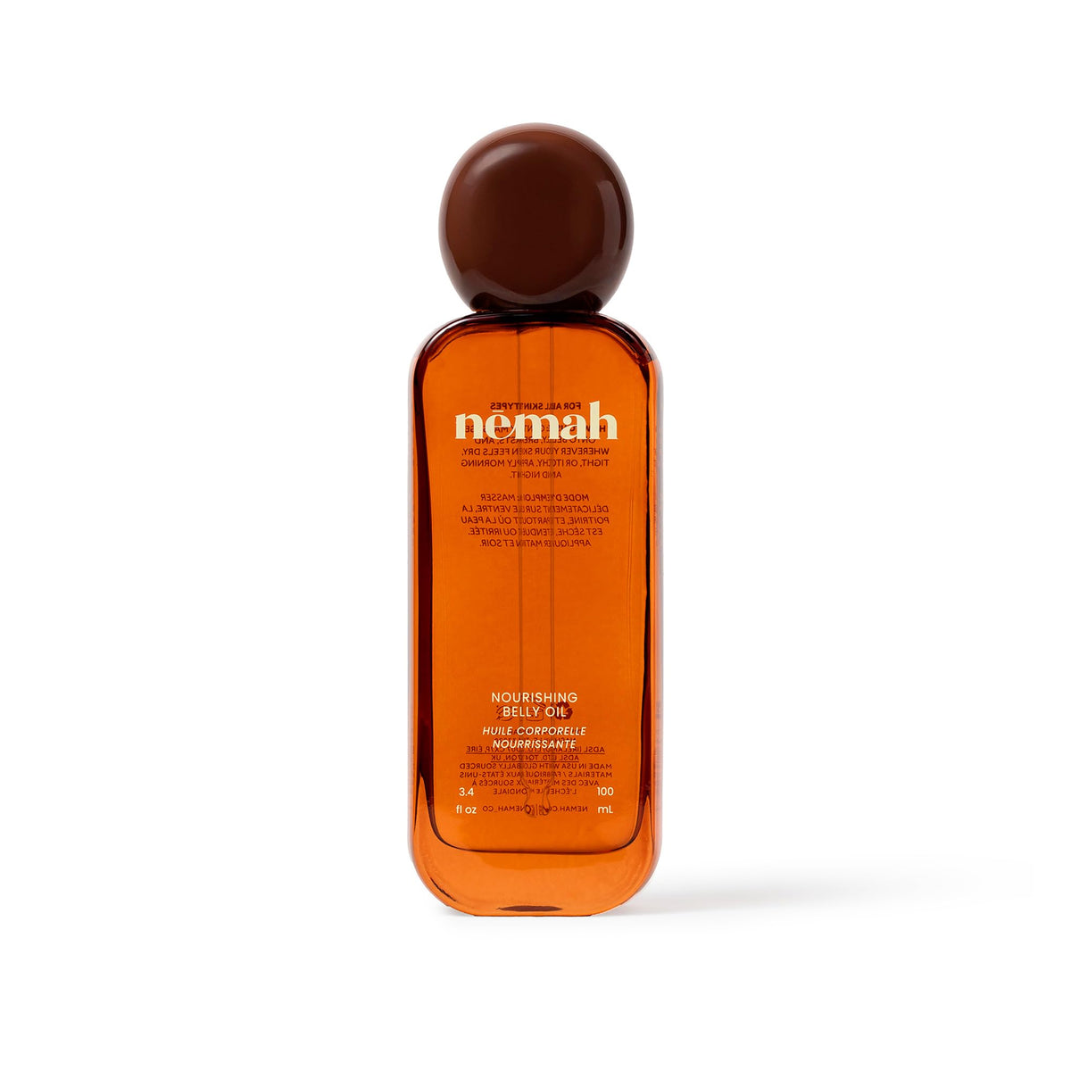 Nemah belly oil front bottle shows clean packaging and quick-dry promise