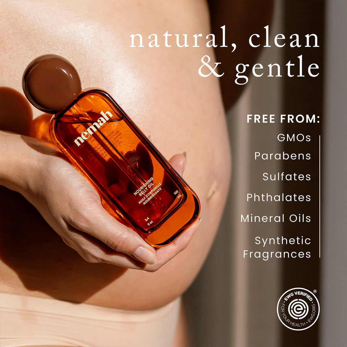 Nemah belly oil ingredients jojoba and coconut close-up showing natural nourishment