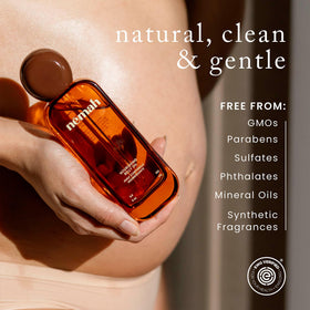 Nemah belly oil ingredients jojoba and coconut close-up showing natural nourishment