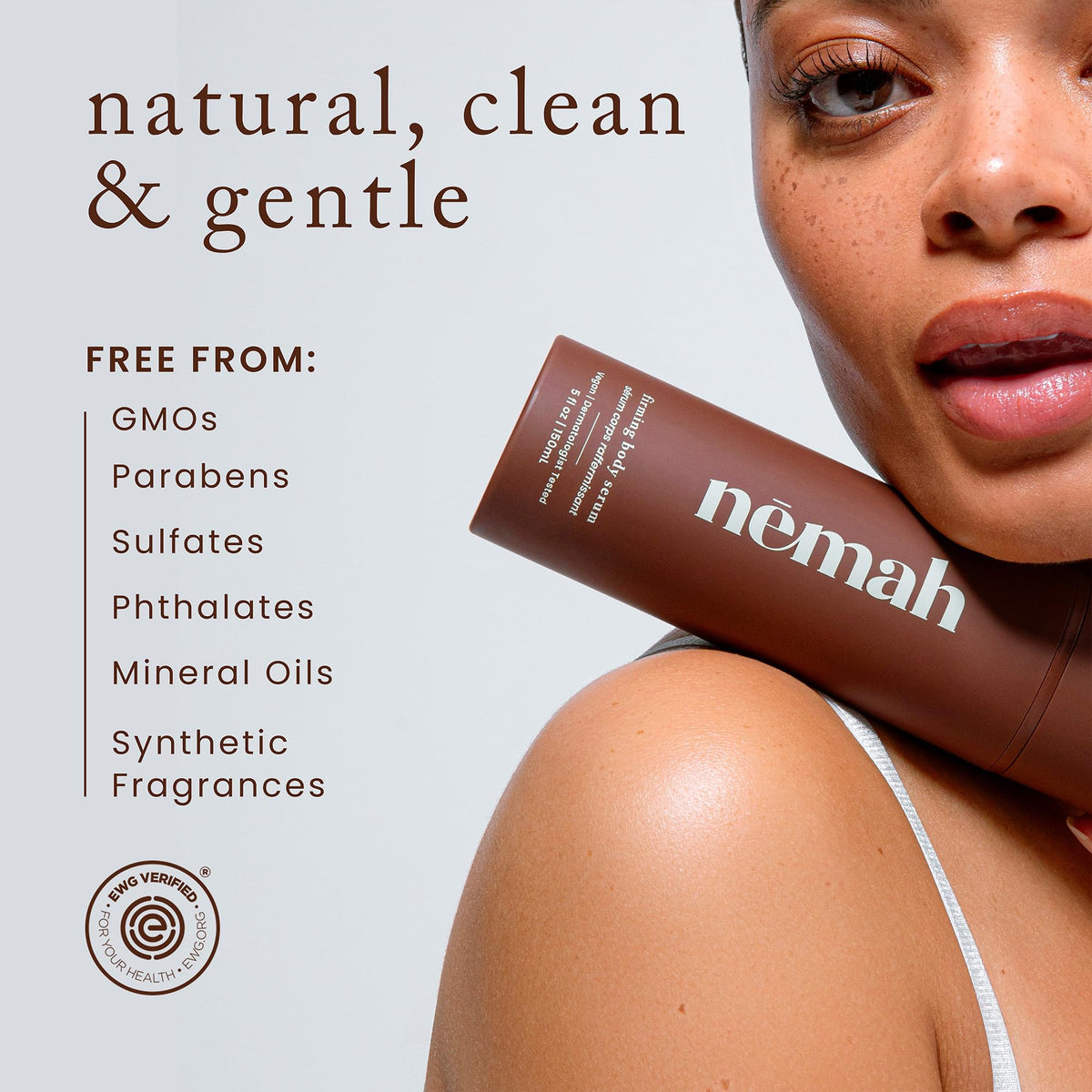 Applying Nemah firming lotion to arm demonstrating smooth massage and firming feel