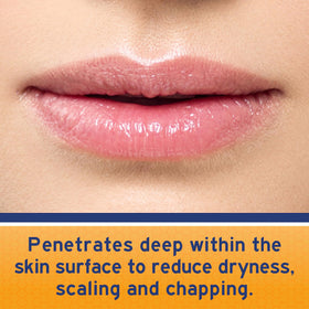 Neosporin balm being applied to lips demonstrating soothing repair overnight