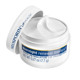 Neosporin tub on a nightstand showing bedside use for restorative nightly care