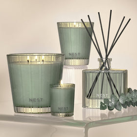 NEST New York bottle styled on a sink countertop providing aromatic decor and uplift