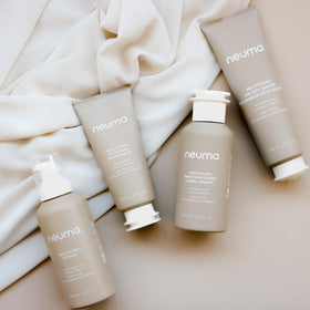 NEUMA in bathroom lifestyle scene showing daily styling convenience benefit