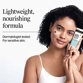 neutrogena bottle in hand showing 3.4 fl oz size for scale and portability