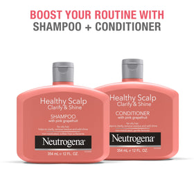 Neutrogena application on scalp being massaged, illustrates exfoliating and soothing action