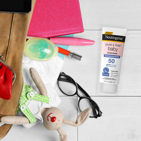 Applying Neutrogena on baby arm to show smooth, tear-free application