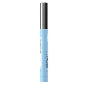 Neutrogena eraser stick held in hand showing size and portability benefit