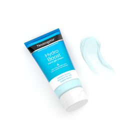 Neutrogena small tube beside larger container conveying convenient travel size benefit