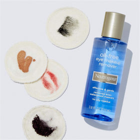 Neutrogena in-use cotton pad on closed eye removing mascara with gentle action