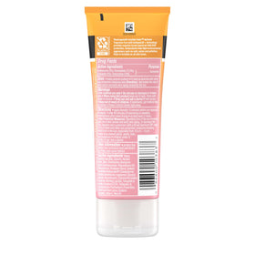 Neutrogena used by urban commuter outdoors showing pollution-defense benefit