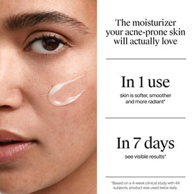 Neutrogena moisturizer on hand scale demonstrating small travel-friendly amount