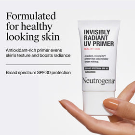 Neutrogena swatch on hand illustrating primer blendability and glow