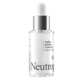 neutrogena held in hand illustrating compact travel-friendly size