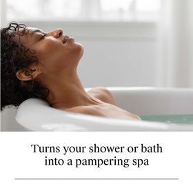 Neutrogena Rainbath added to bathtub, demonstrating skin-softening bath benefit