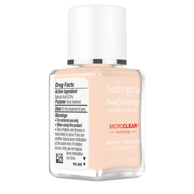 Neutrogena size comparison next to coin showing the 1 fl. oz. compact bottle