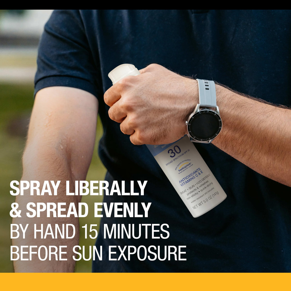 Neutrogena being sprayed on athlete shoulder for sweat-resistant protection