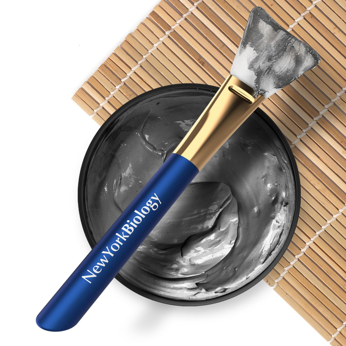 New York Biology mask applied on cheek during home spa treatment for clearer pores