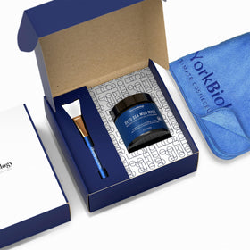 New York Biology brush applicator with mud mask demonstrating easy mess-free application