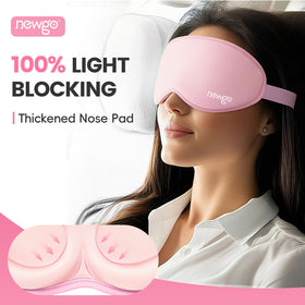 NEWGO model wearing mask in bed demonstrating travel and sleep benefit