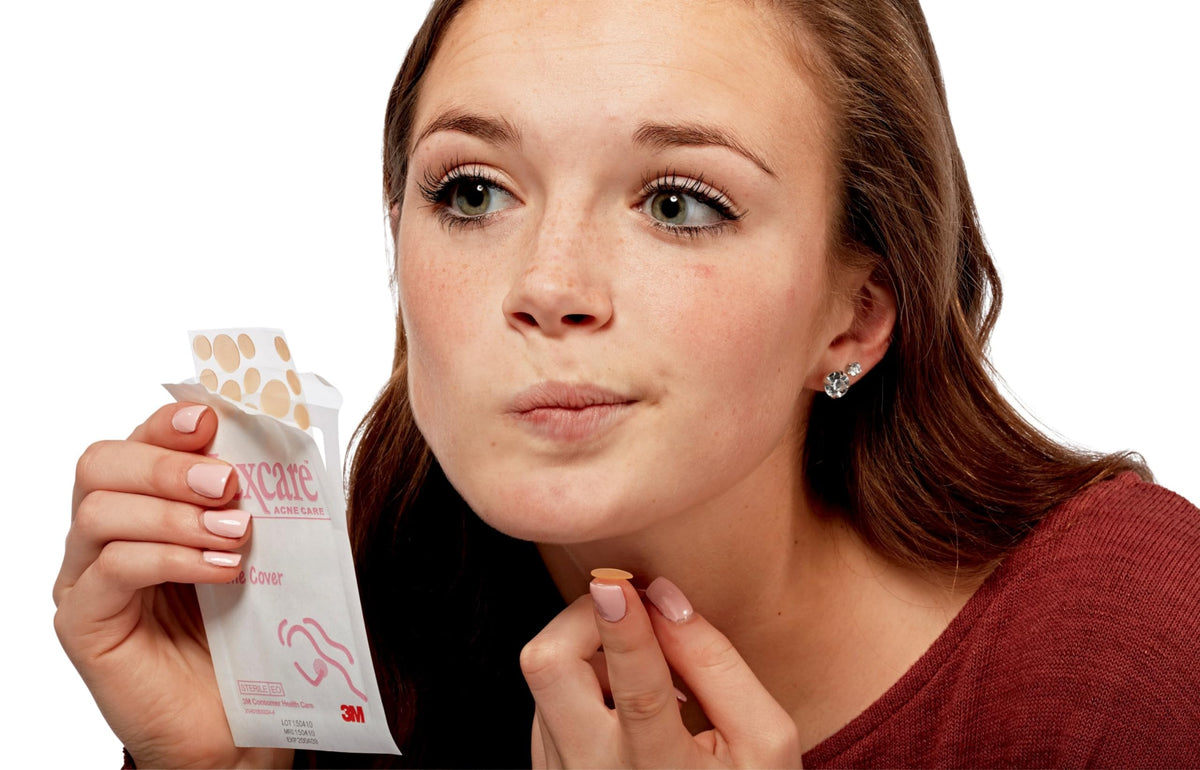 Nexcare patch held in hand to show scale and discreet protection benefit
