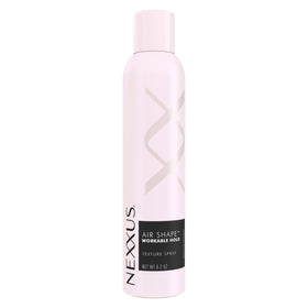 Nexxus front packaging showing spray can and branding with styling benefits