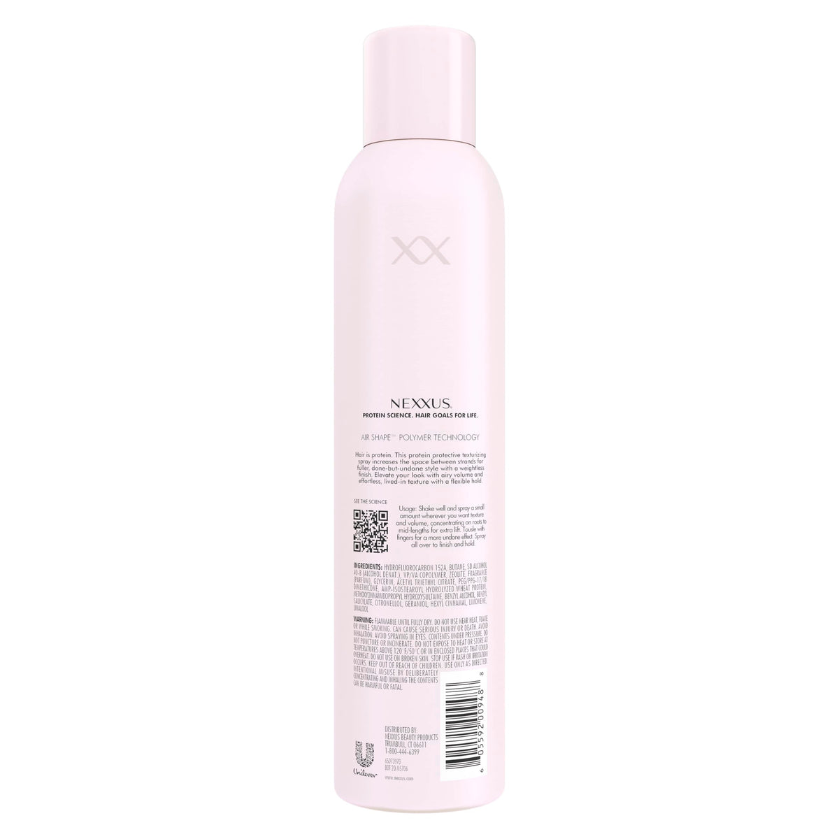 Nexxus close-up of spray mist and texture particles demonstrating airy lift