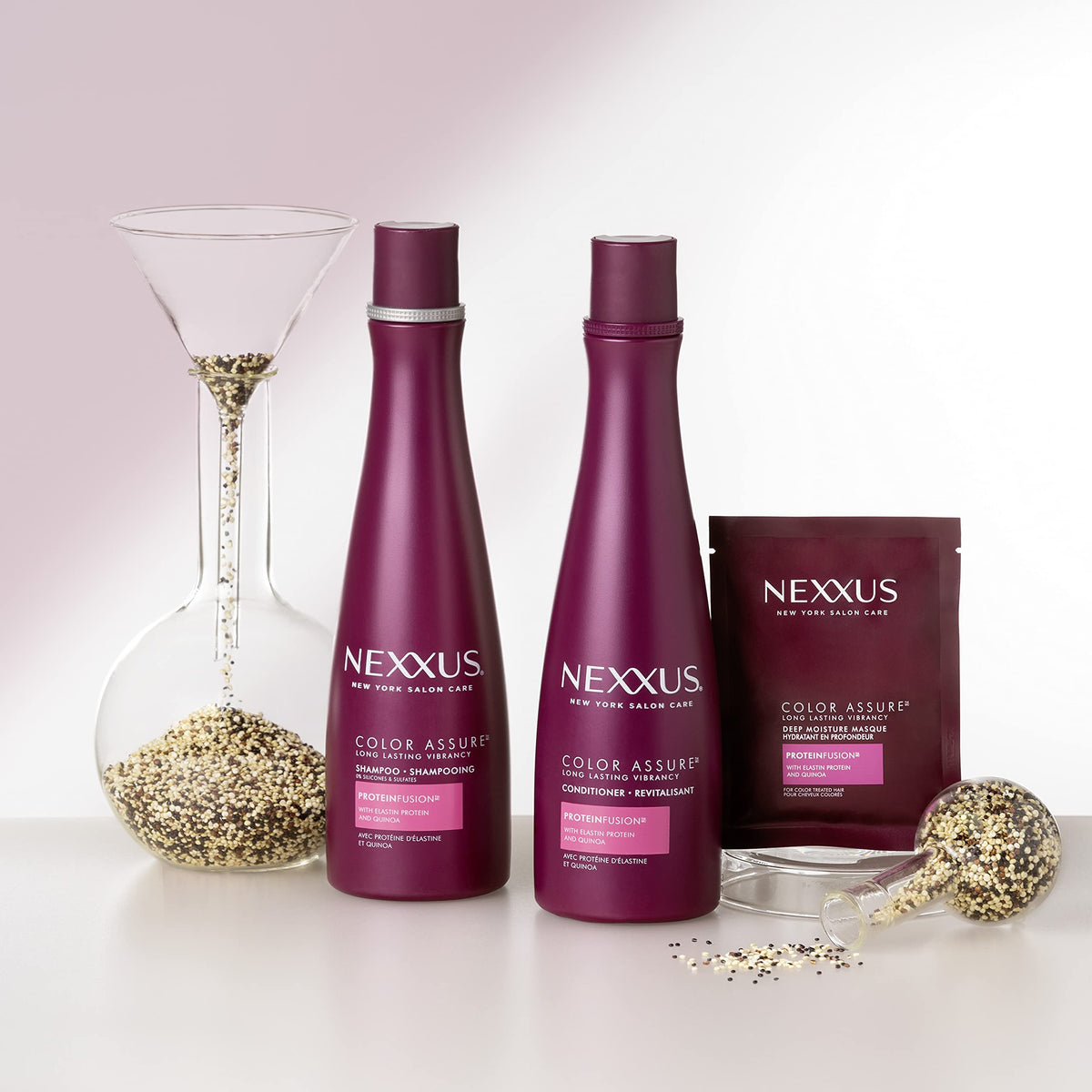 Nexxus 13.5oz bottles next to a ruler showing real size and value