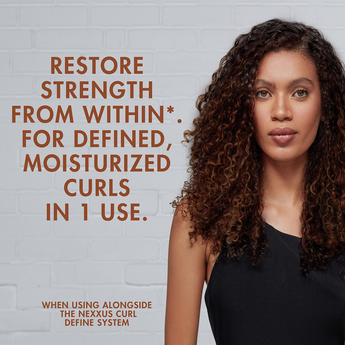 Nexxus on bathroom shelf styled with curl tools for a salon-quality routine