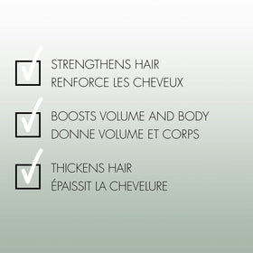 Nexxus bottle placed by styling tools in bathroom suggesting fuller hair results