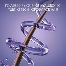 Nexxus HY-VOLUME conditioner cream texture on fingers showing hydration and detangling benefit