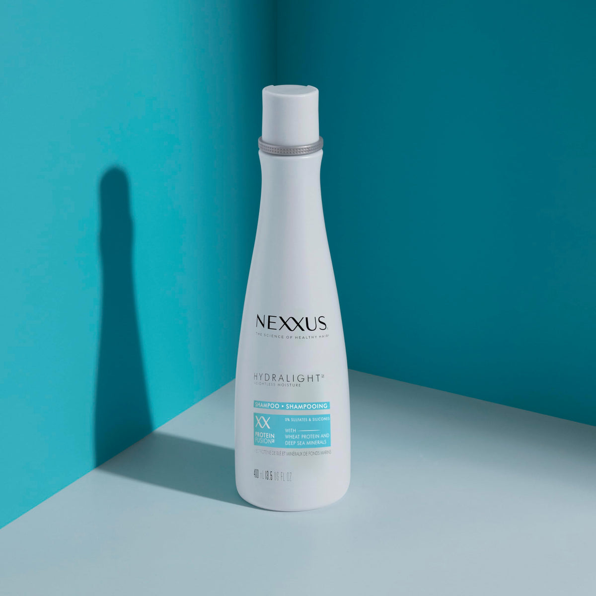 Side-by-side Nexxus before and after smoother strands benefit