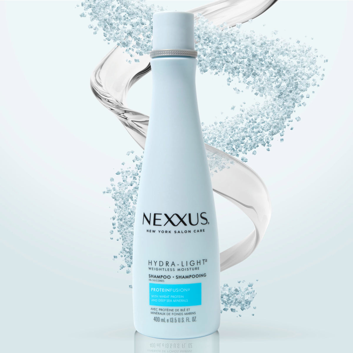 Hand applying Nexxus Hydralight in shower showing gentle cleanse benefit