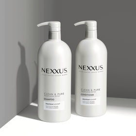 Nexxus bottles staged in bathroom showing everyday routine
