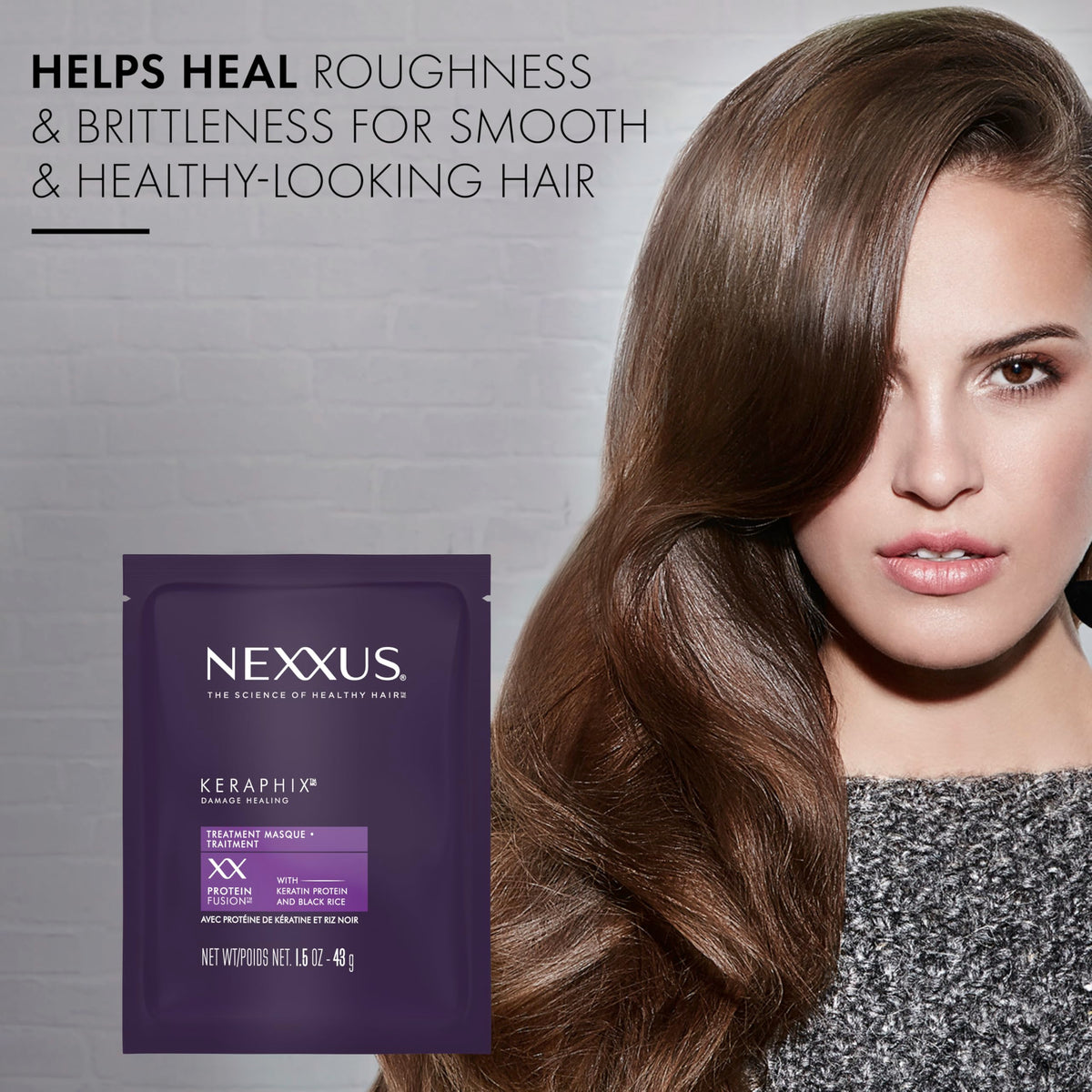 Nexxus KERAPHIX being applied in shower to restore strength and softness