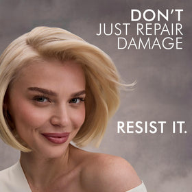 Nexxus conditioner rinsing through hair showing smoother results