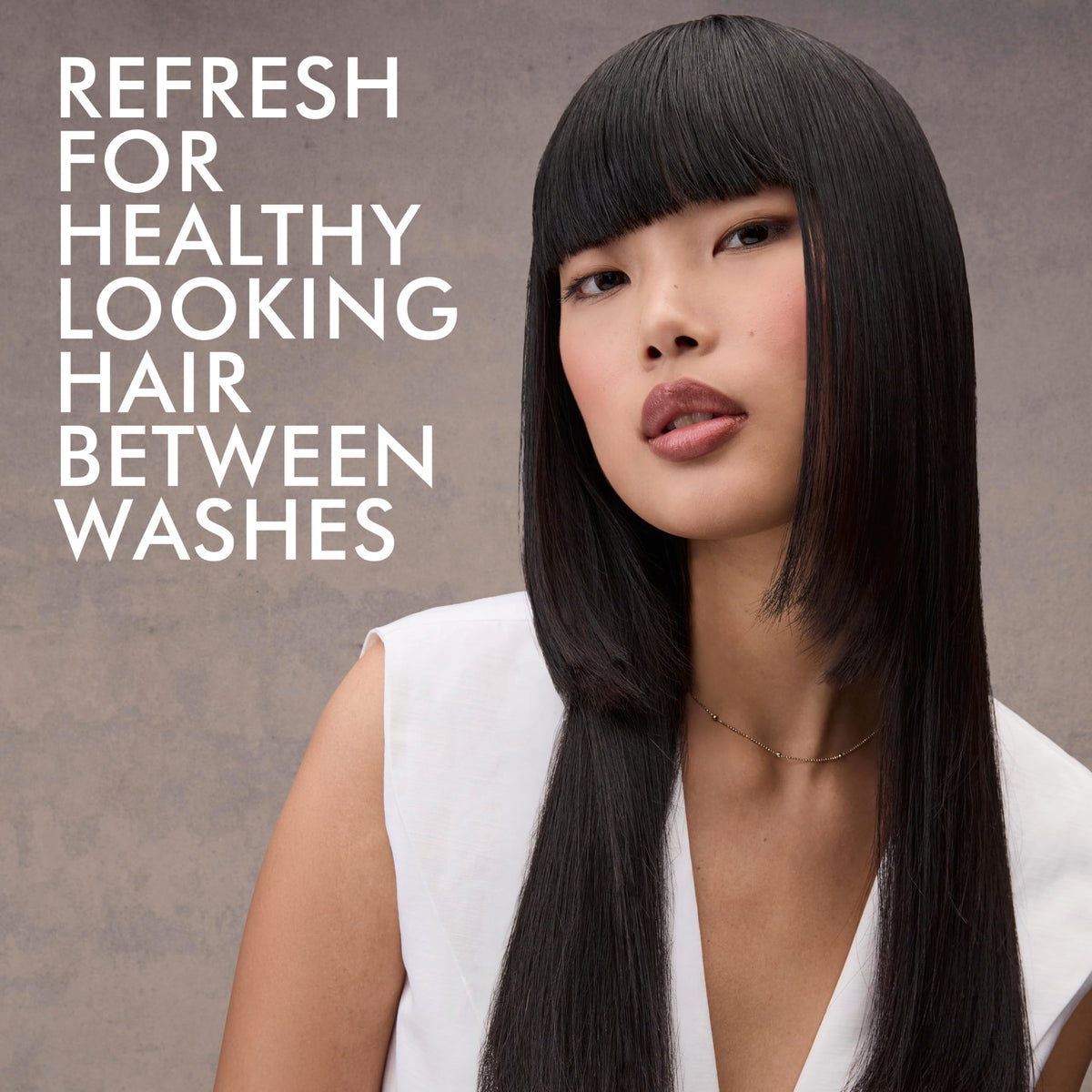 Nexxus applied to dark hair with no white residue, preserving color