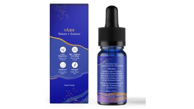 nfuse dropper applying serum to scalp highlighting precise application and reduced mess