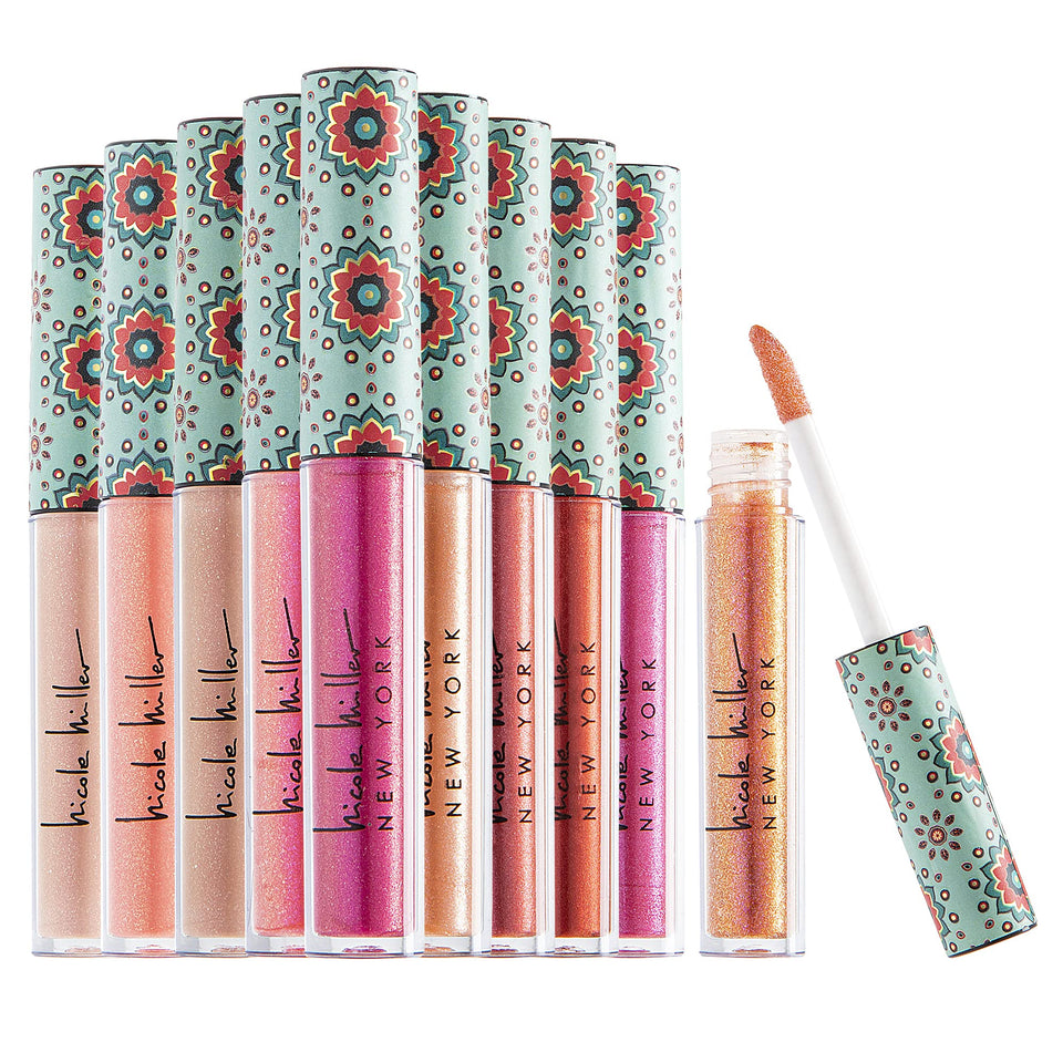 Nicole Miller front view of ten gloss tubes showing color variety and quick selection benefit