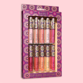 Nicole Miller lip swatch on model displaying glossy shine and flattering color