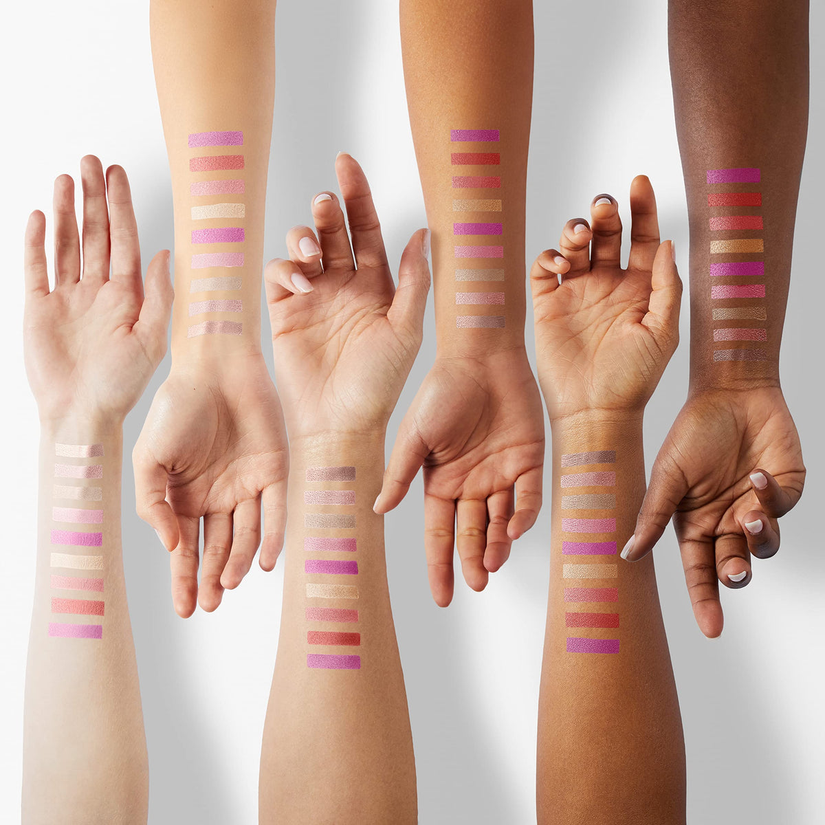 Nicole Miller New York tubes lined up showing variety and portability for on-the-go touch-ups