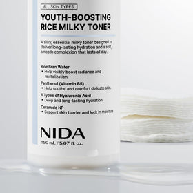 NIDA lifestyle image with model showing dewy glass-skin finish and healthy radiance