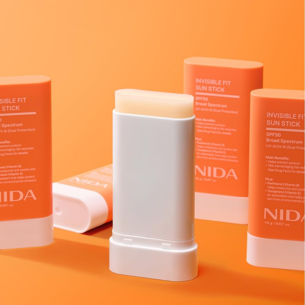 NIDA sun stick used outdoors on a walk showing portable sun protection benefit
