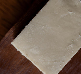 Nimba Foods melting shea butter on hand demonstrating quick skin-melt for easy application