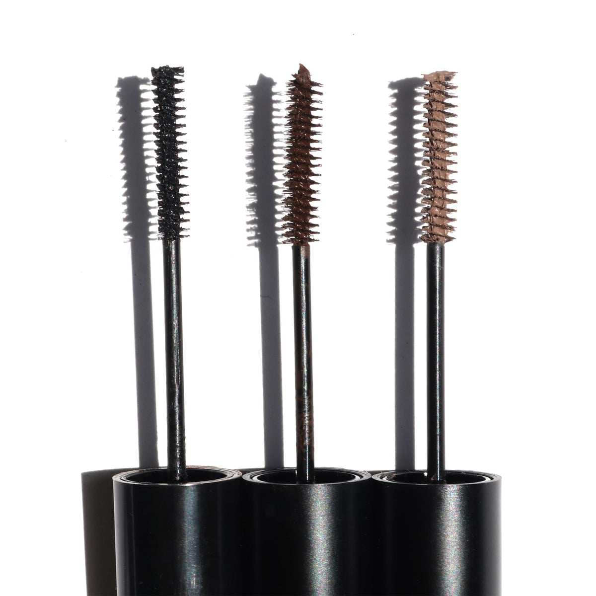 NINETEEN NINETY NINE mascara applied on lashes demonstrating natural tint and lengthening benefit