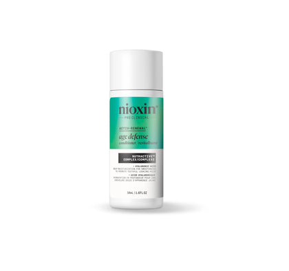 NIOXIN front tube showing Age Defense Conditioner label and compact travel benefit